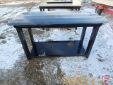 Welding work table with under shelf, adjustable feet, and 1/4