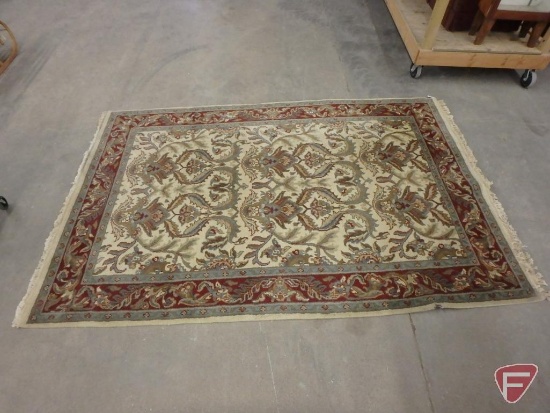Area rug 116"W x 77"D some damage
