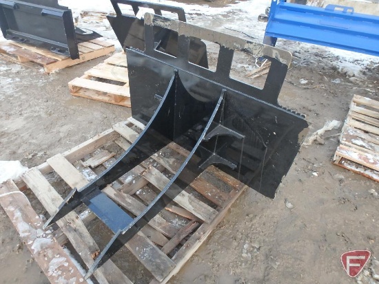 Earth Beaver skid steer attachment with universal quick attach mount, (2) 35" x 5/8" teeth