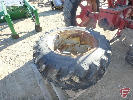 (2) Armstrong 12.4-28 fluid filled tires on spin-out rims, one leaks