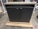 Double sided counter with electrical cord access in top
