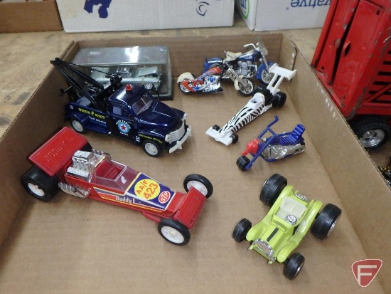 Ceramic angels, clowns, kerosene lamps, toy cars and trucks. 6 boxes