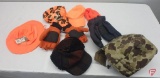 Blaze orange hats, gloves, camo hood, ear flap cap
