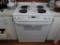General Electric 4-burner stove with oven model JSP34W0D2WW