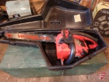 Homelite gas chainsaw with case and other wood chainsaw box