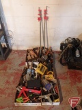 Forstner bits, saw blade, flash light, leather tool belt, honing stones, calking gun, wire stripper