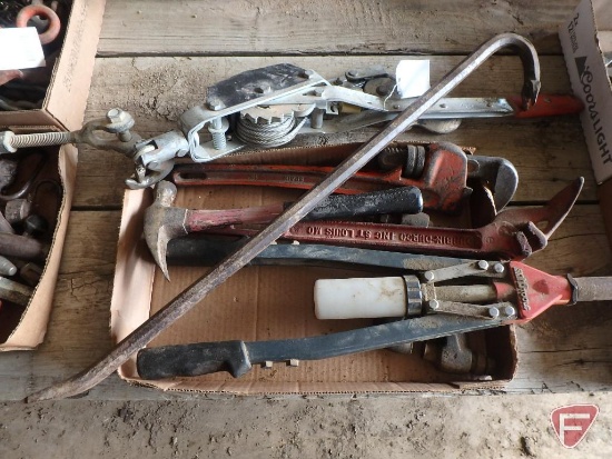 Come-along, pipe wrenches, rivet tool, crow bar, and wire stretcher