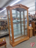 Lighted curio cabinet with side opening doors, 45