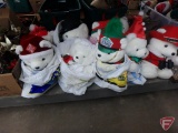 Large assortment of christmas decorations, all on bottom shelf