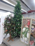 Christmas trees with decorations and window,