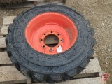 Argus Advanta 12-16.5 tubeless skid loader tire on 8-bolt rim