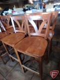 (4) Wood high-top/bar height chairs with backrest and metal footrest guard, 31