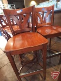 (2) Wood high-top/bar height chairs with backrest and metal footrest guard, 31