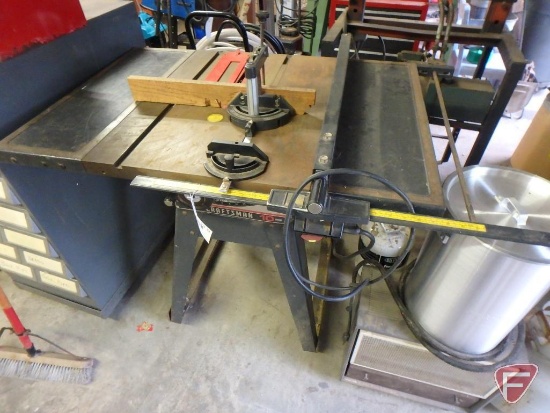 10" Craftsman table saw on stand with casters