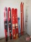 (2) sets of water skis and (2) sets snow skis with poles