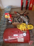 Portable air tank, come-along, spare tire bracket, tire wrench, jumper cables, ropes