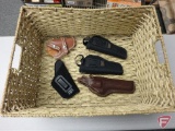 Holsters (5) in woven basket