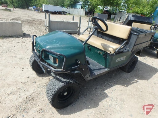 2000 EZ-GO Workhorse ST350 gas utility vehicle with electric dump, green, brush guard, lights