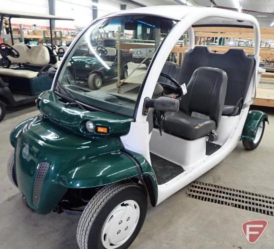 2001 Gem E825 4-passenger electric golf car with top and windshield, green and white