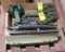 Toy John Deere equipment, antique license plates, collapsible fishing rod, tackle box