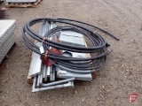 Plastic tubing, tent poles, miscellaneous galvanized steel pipe; contents of pallet