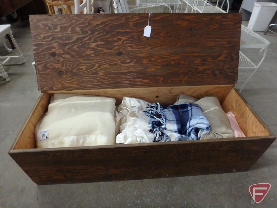 Wood storage box, 55"w x 22"d x 16"h with blankets and bed linens