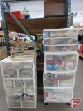 Plastic organizers with large assortment of craft supplies