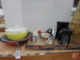 Wok, pyrex bowl, salt and pepper shakers, Mr Coffee, travel steamer, coffee press, measuring cups