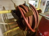 (3) Metal containers, plastic barrel with sweeping compound; (2) air hose with reels