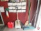 Gas can, shovel, brooms