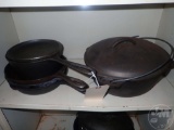 CAST IRON PANS ON SHELF