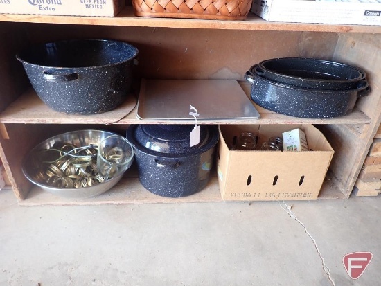 Enamel roasters, canner, pot; canning jars and rings; cookie sheets. Contents of bottom 2 shelves