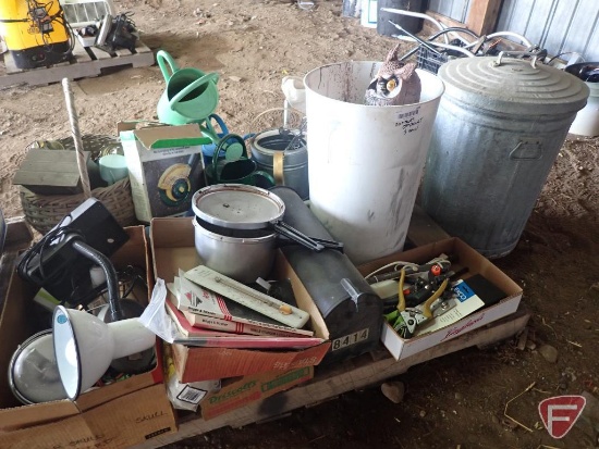 Can with lid, plastic owl, mailbox, lanterns, watering cans, lights, garden tools.