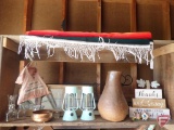 Decorative items: plate racks, wall blanket, metal vase; LED lanterns. Contents of top 2 shelves