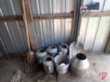 Watering cans, galvanized pail, shovel, broom, pitchfork, stainless container
