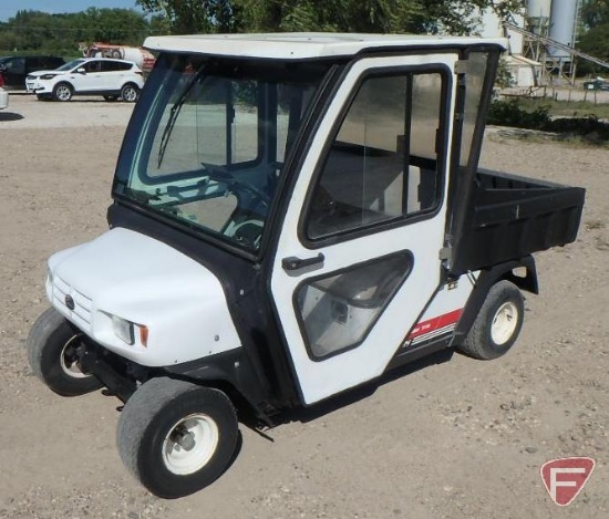 2004 Cushman Commander 2100 electric utility vehicle with cab and manual dump box, white, lights