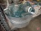 Galvanized tub with canning jars and glass lids