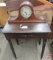 Ingraham mantle clock, one-drawer table 23