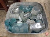 Canning jars and glass lids in galvanized tub