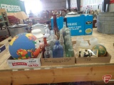 Bottles, glass globes, globe sport ball, shadow thermometer, small globe