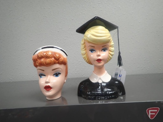 (2) Barbie head vases. Graduate is 7"h