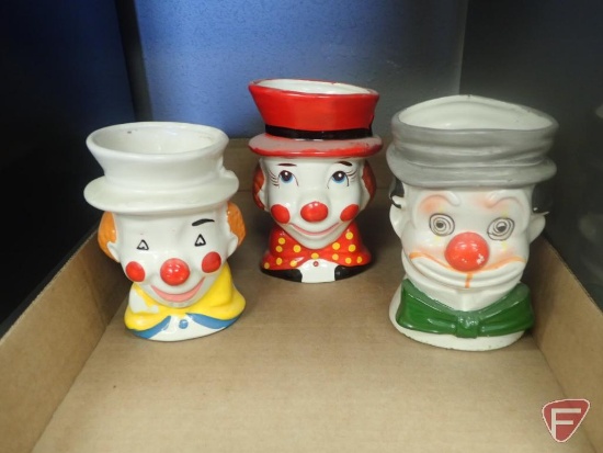 Clown head vases, 4-6"h, one with thermometer is 4.5". 2 boxes