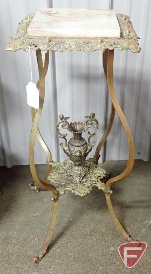 Metal 13" square stand with attached vase, cherub faces, 30"h