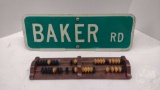 METAL BAKER ROAD SIGN WITH WOOD POOL COUNTER