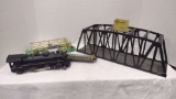 GILBERT AMERICAN FLYER BRIDGE, ENGINE 666, AND ELECTRIC TRAIN PARTS.