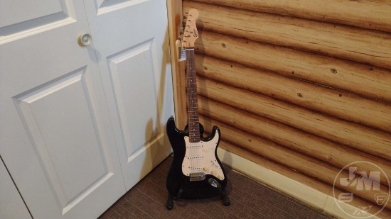 FENDER SQUIER BULLET STRAT ELECTRIC GUITAR WITH STAND; ITEMS LOCATED