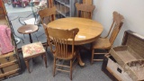 ROUND OAK TABLE WITH 4 MATCHING CHAIRS 44