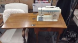NECCHI SEWING MACHINE IN CABINET, AND WOOD STORAGE BOX/SEAT