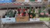 GLASS SODA BOTTLES, COKE, SQUIRT, 7UP ROCK SPRING WATER, SOME