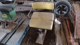 TRACTOR SEAT MOUNTED TO BOARD